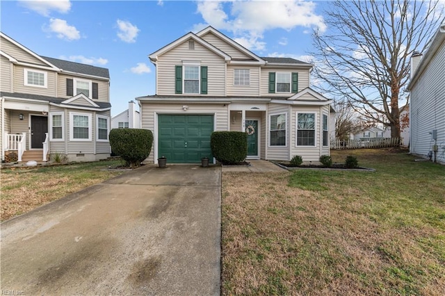 front of property featuring a garage and a front lawn