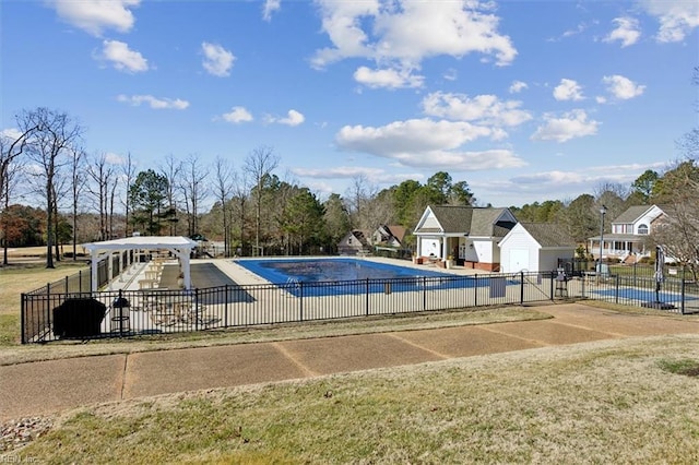 view of swimming pool with a lawn and a patio area