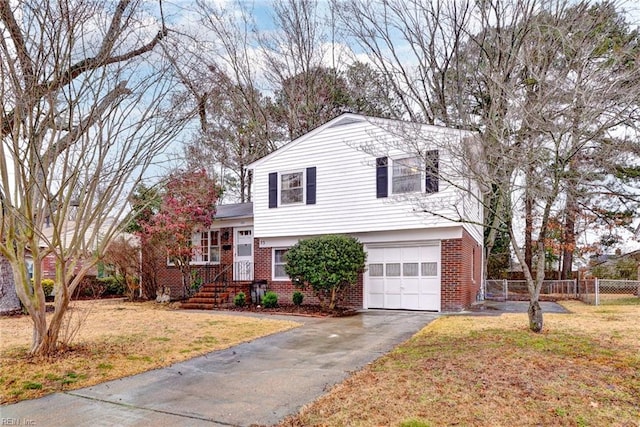 view of front of property with a garage and a front yard