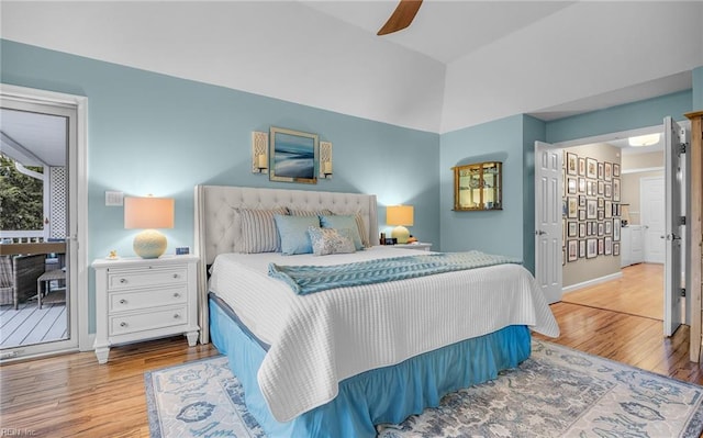 bedroom featuring wood-type flooring, ceiling fan, and vaulted ceiling