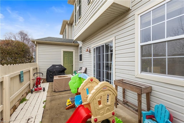 wooden deck featuring grilling area