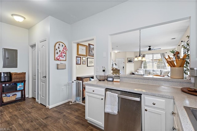 kitchen with dark wood-type flooring, hanging light fixtures, stainless steel dishwasher, electric panel, and white cabinets