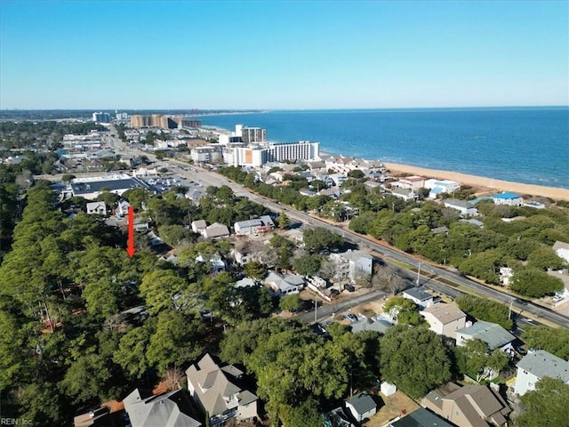 aerial view featuring a view of the beach and a water view