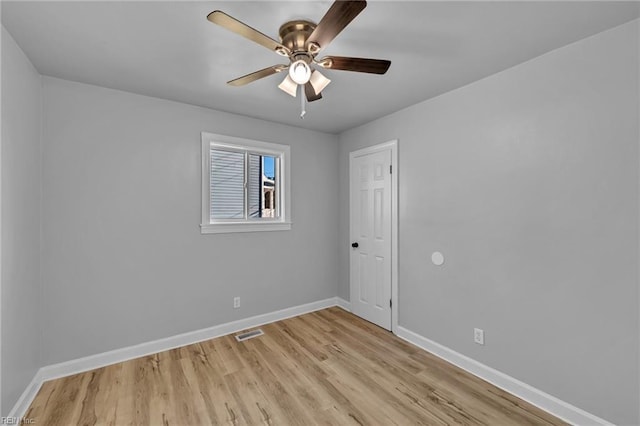 unfurnished room with ceiling fan and light wood-type flooring