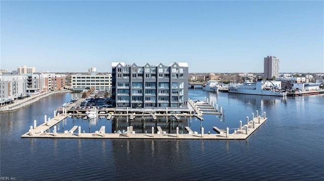 dock area with a water view and a city view