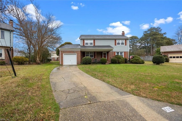 view of front of home featuring a garage and a front lawn