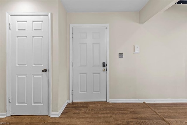 interior space with dark wood-type flooring