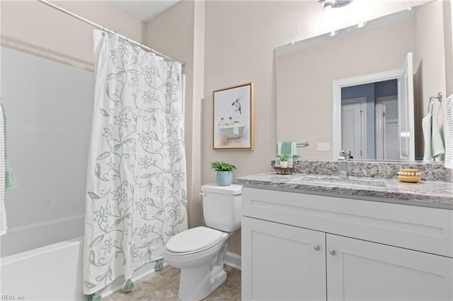 full bathroom with vanity, toilet, and shower / bath combo