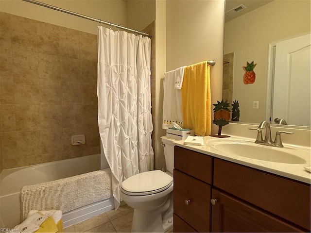 full bathroom with tile patterned flooring, vanity, shower / tub combo, and toilet