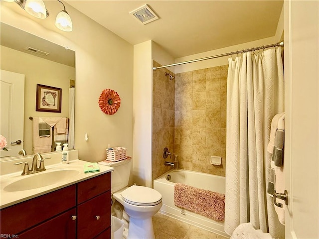 full bathroom featuring shower / tub combo, vanity, tile patterned floors, and toilet