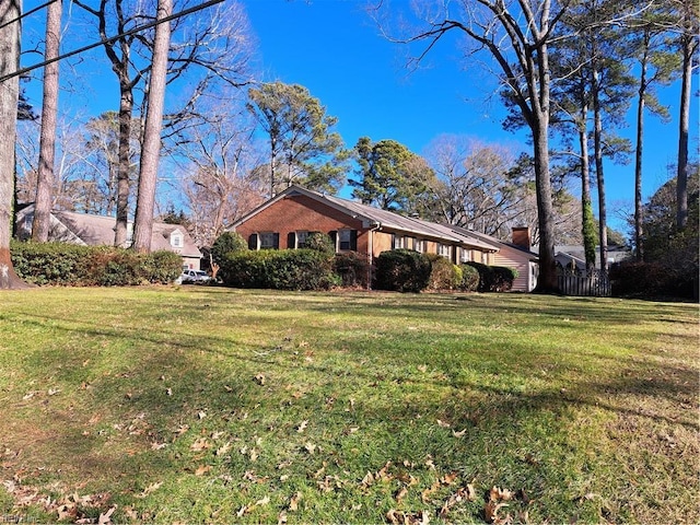 view of home's exterior featuring a yard