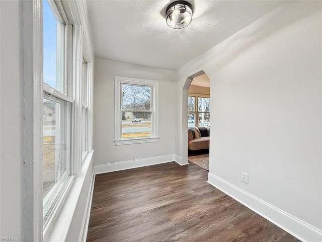 428 Hampton Roads Ave, Hampton, VA 23661 - unfurnished room featuring dark hardwood / wood-style flooring and a textured ceiling