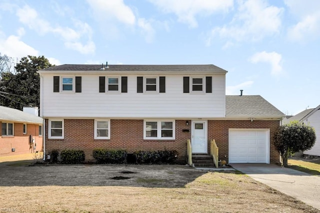 view of front facade featuring a garage and a front yard