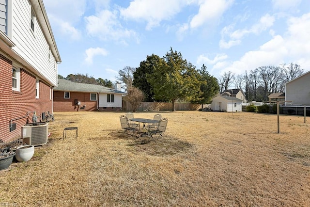 view of yard with central AC unit