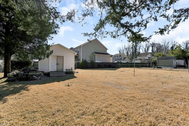 view of yard featuring a storage unit