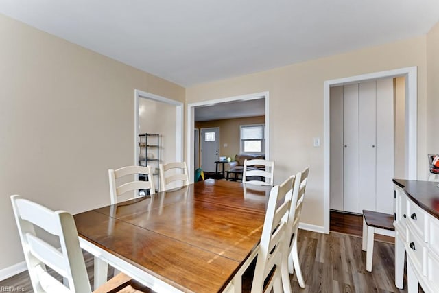 dining space featuring hardwood / wood-style floors