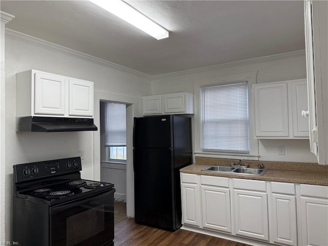 kitchen with dark wood-type flooring, sink, crown molding, black appliances, and white cabinets