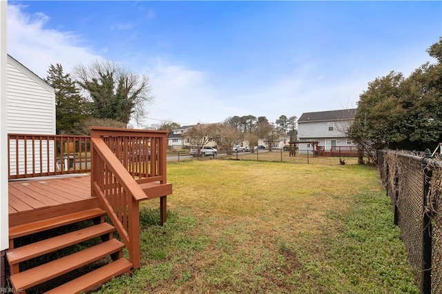 view of yard featuring a deck