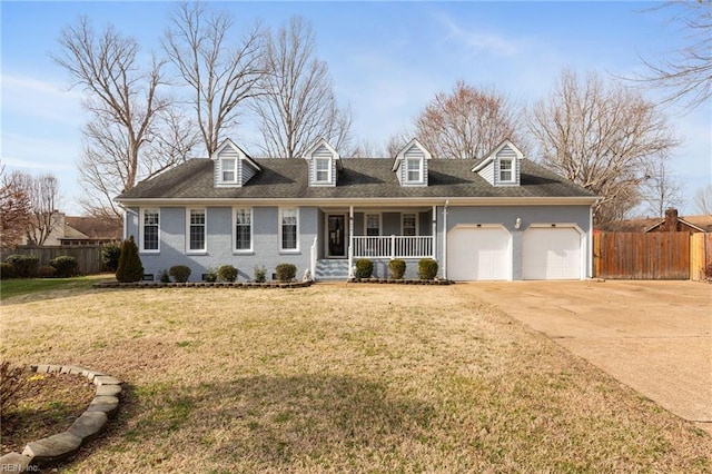 new england style home with a garage, a porch, and a front yard