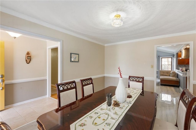 tiled dining room with crown molding