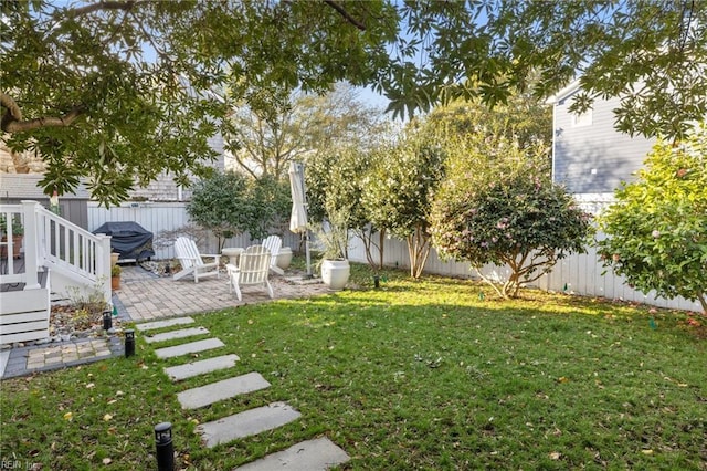 view of yard with a patio area