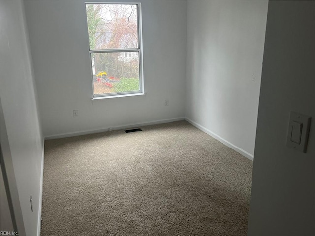 view of carpeted spare room