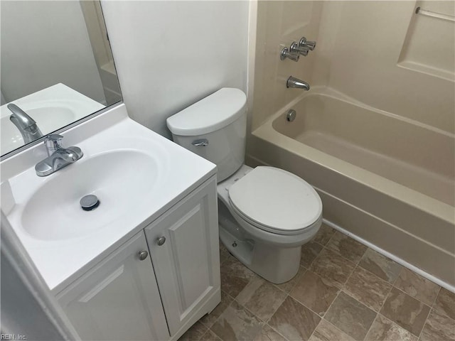 full bathroom featuring vanity, tub / shower combination, and toilet