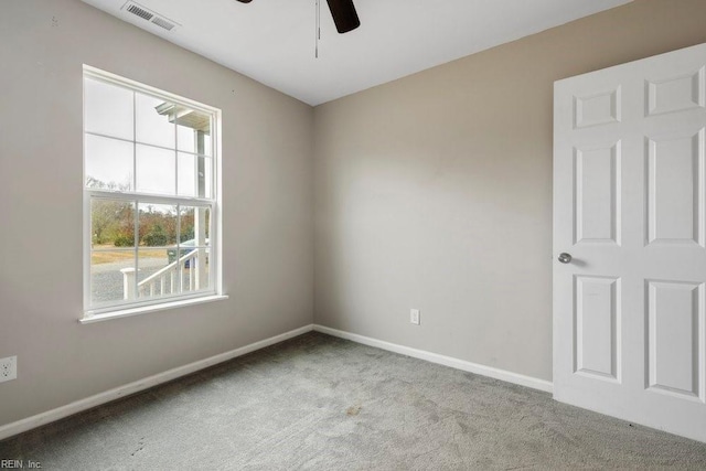 carpeted empty room with ceiling fan