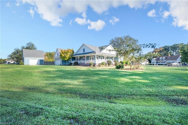 view of front of home featuring a front yard and covered porch