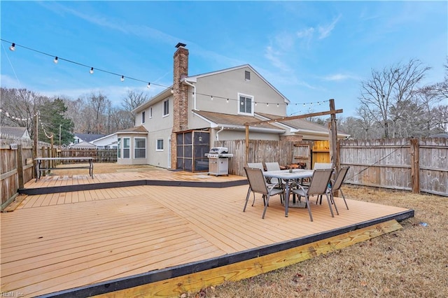 wooden terrace with grilling area