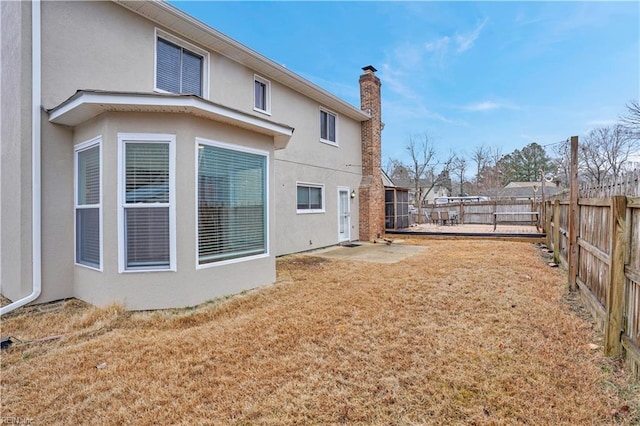 exterior space with a yard and a patio