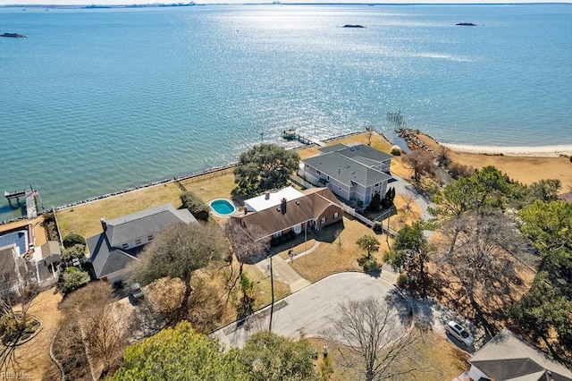 aerial view featuring a water view and a beach view