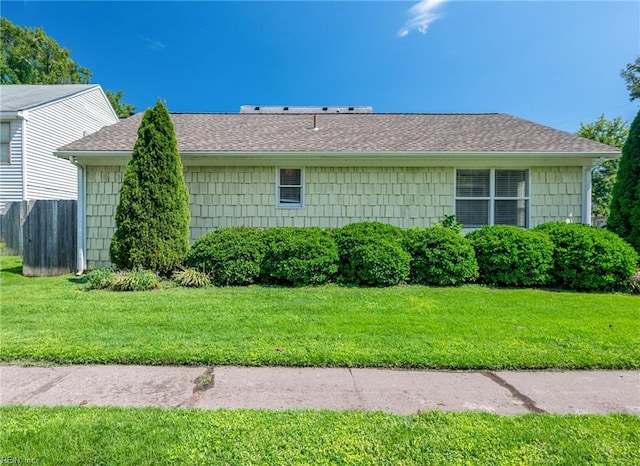 view of home's exterior featuring a lawn