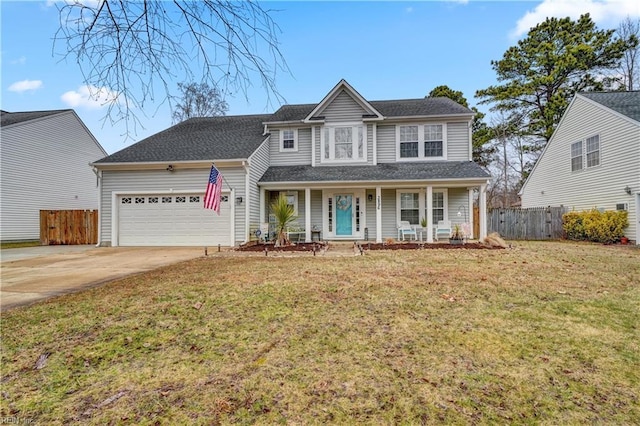 view of front of home with a garage, a porch, and a front lawn