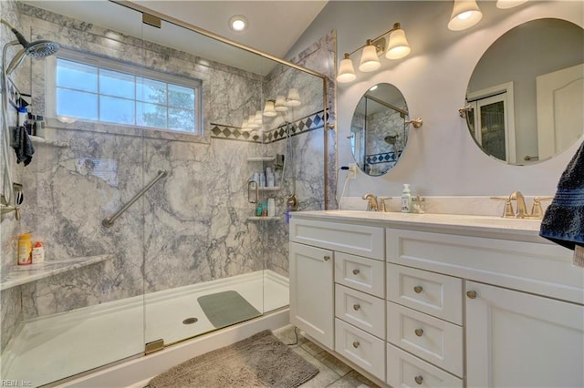 bathroom with lofted ceiling, vanity, and a shower with shower door