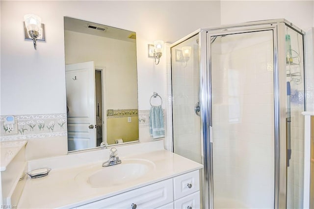 bathroom featuring vanity and walk in shower