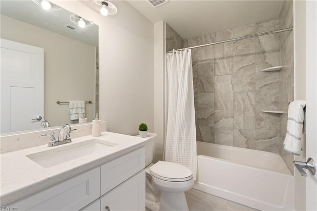 full bathroom featuring vanity, toilet, and shower / bath combo