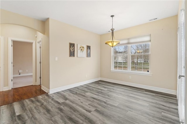 unfurnished dining area with hardwood / wood-style flooring