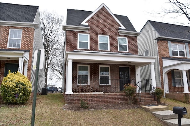 view of front facade with a porch and a front yard