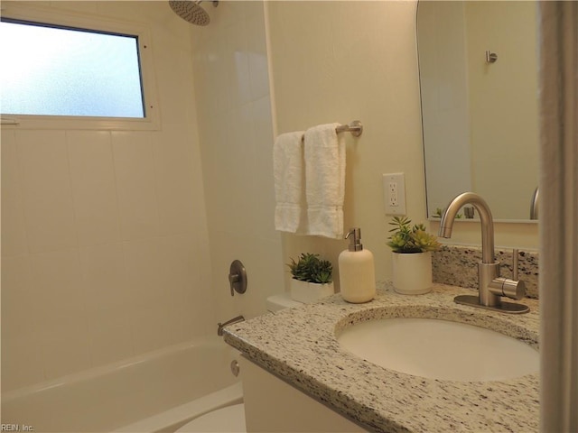 bathroom featuring vanity and tub / shower combination