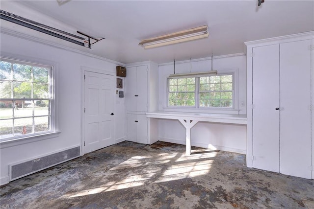 interior space featuring ornamental molding