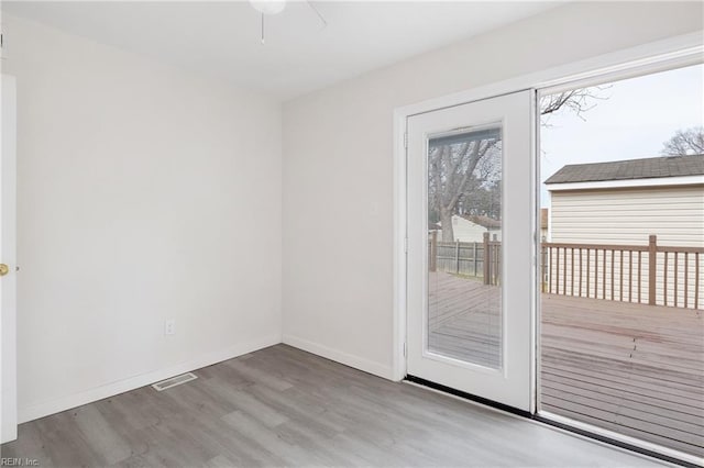 doorway to outside featuring hardwood / wood-style floors