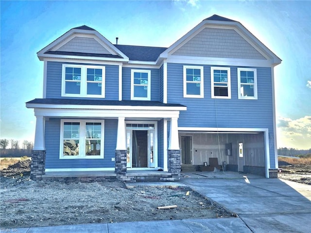 view of front of property featuring a garage