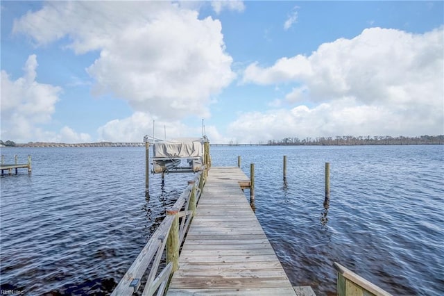 dock area featuring a water view