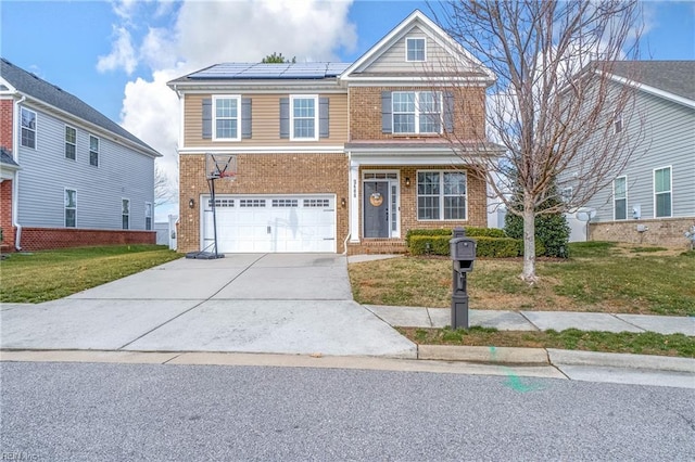 2608 River Watch Dr, Suffolk, VA 23434 - view of front facade featuring a garage, a front lawn, and solar panels