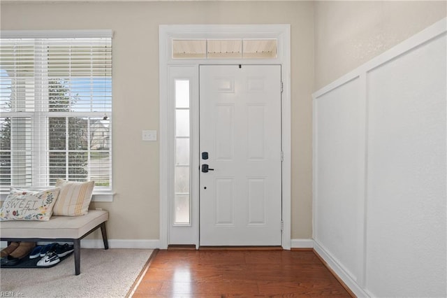 foyer with wood-type flooring