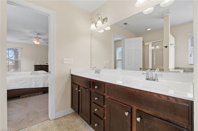 2608 River Watch Dr, Suffolk, VA 23434 - bathroom featuring vanity, a shower with shower door, tile patterned floors, and ceiling fan