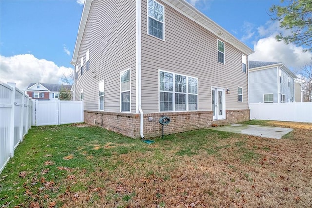 2608 River Watch Dr, Suffolk, VA 23434 - rear view of property featuring a patio and a lawn