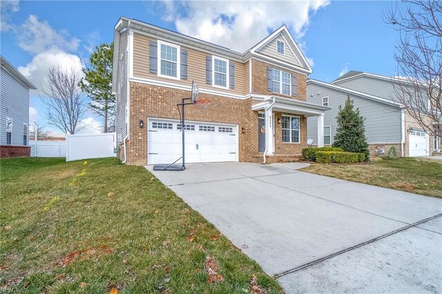 2608 River Watch Dr, Suffolk, VA 23434 - view of front of property with a garage and a front yard