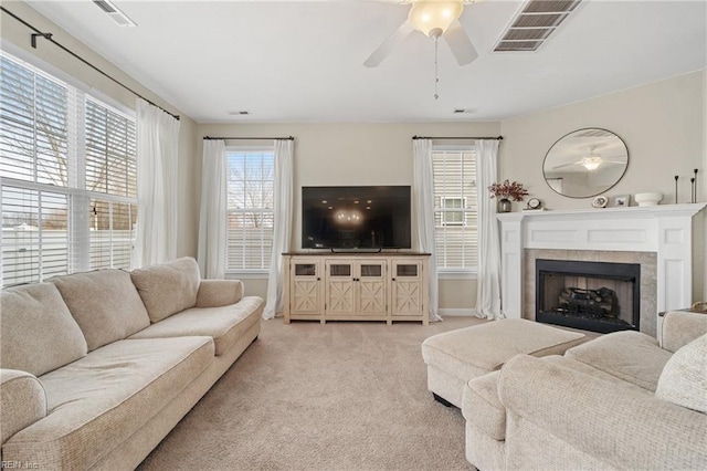 2608 River Watch Dr, Suffolk, VA 23434 - carpeted living room featuring ceiling fan and a fireplace